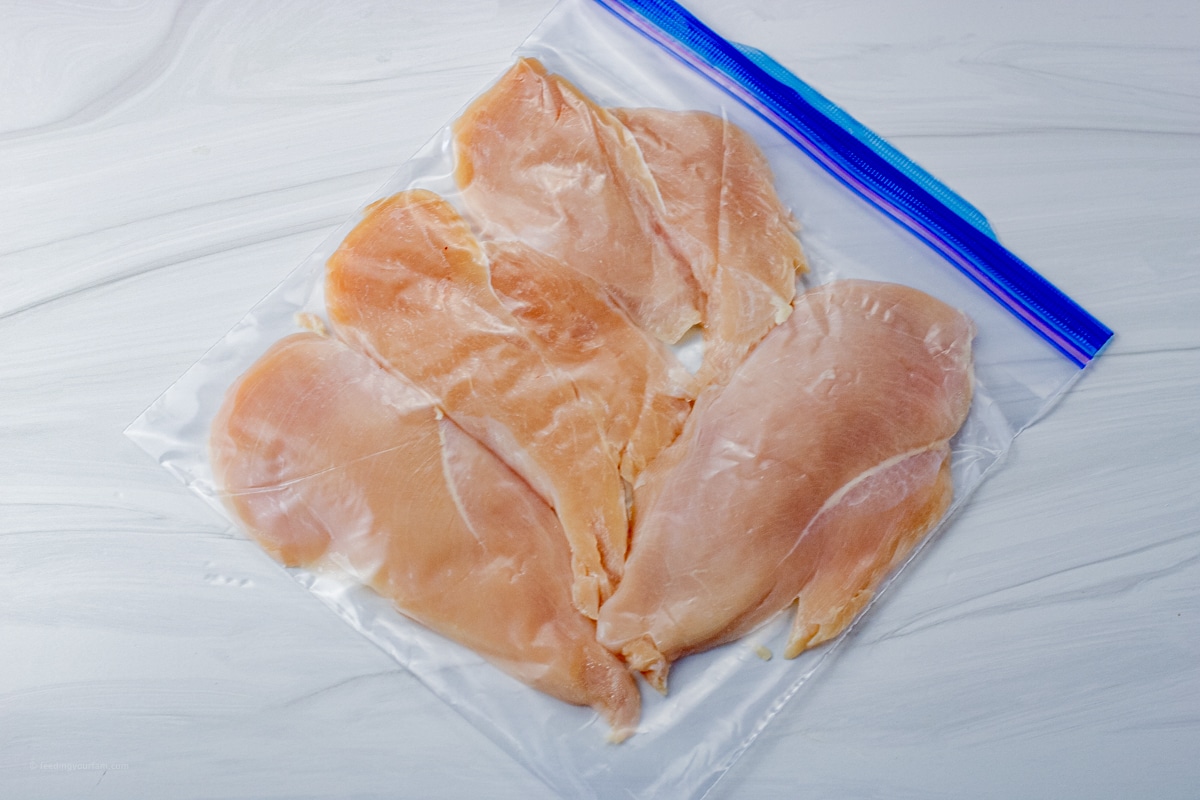 chicken breasts pounded thin in a zip top bag
