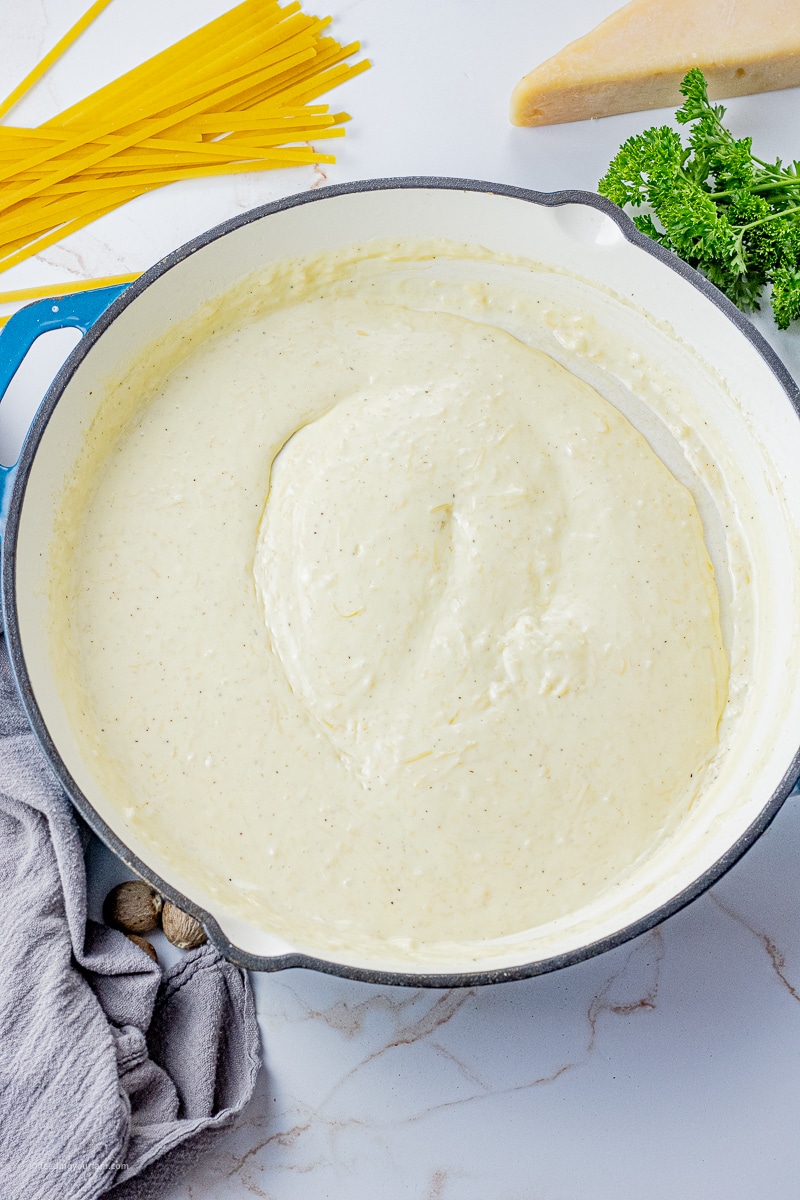 This simple Alfredo Sauce recipe is rich, creamy and so easy to make. Made with butter, heavy cream, garlic and parmesan.