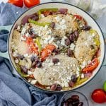 chicken with tomatoes, green peppers, mushrooms, kalamata olives and feta cheese in a big pan