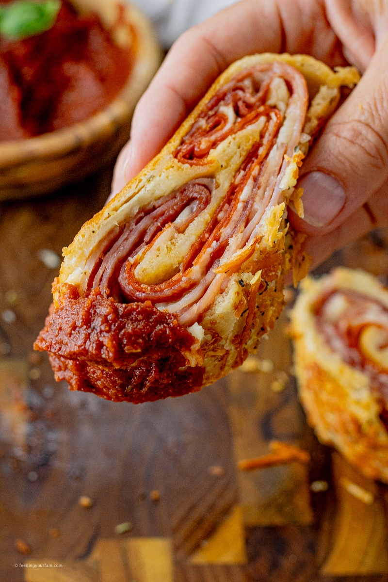 Loaded with pepperoni, ham, Italian salami, mozzarella and parmesan in a homemade pizza dough, stromboli is a dinner your fam will want to make again and again. This simple stromboli recipe is perfect for a quick weeknight dinner or impress your guests by making this as a filling appetizer or game day snack.