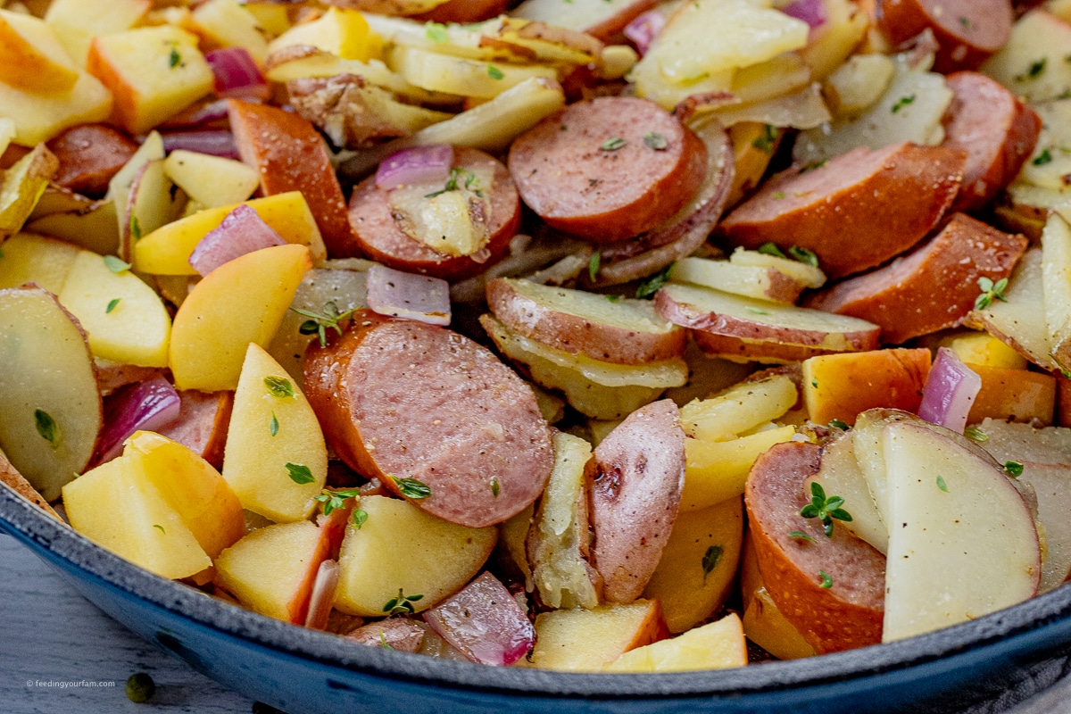 apples, sliced potatoes and sliced turkey sausage in a large skillet