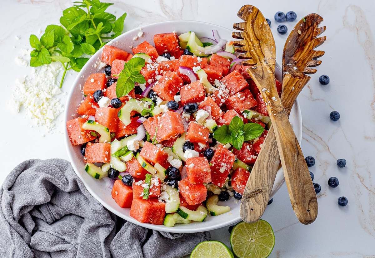 watermelon salad with feta cheese, cucumbers and blueberries