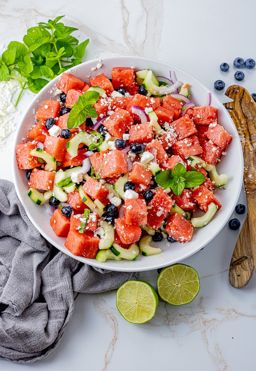 watermelon cubes with blueberries, feta cheese and cucumbers