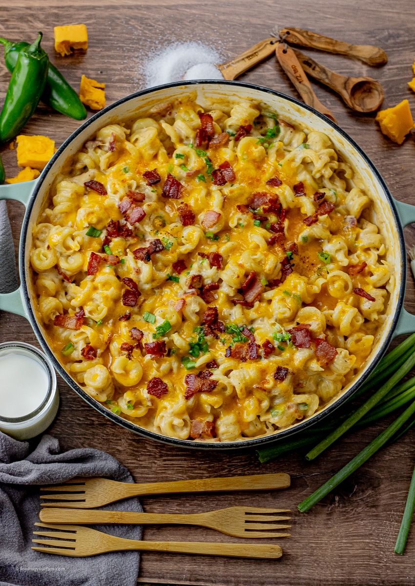 big pan of mac and cheese with bacon and jalapenos