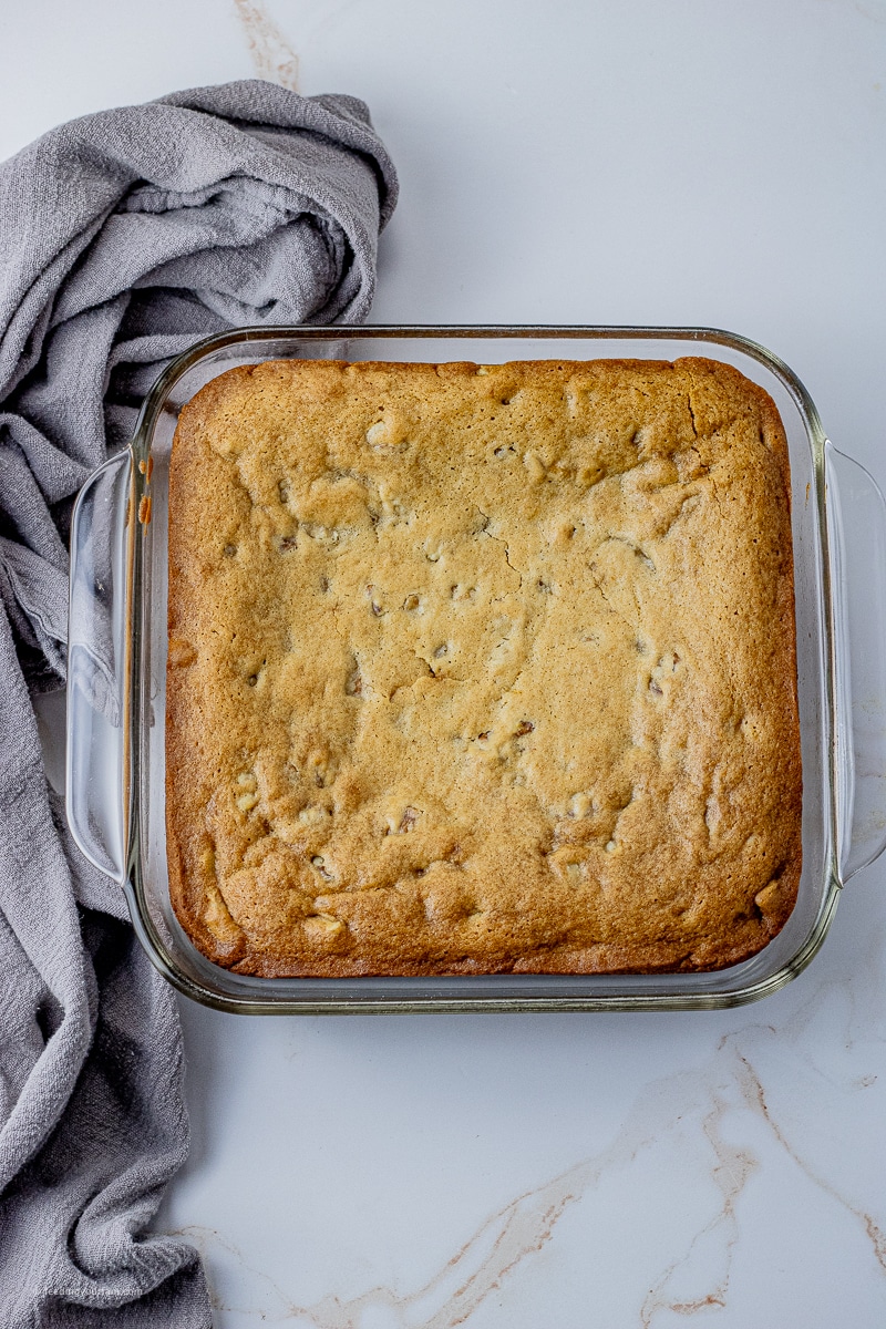cooked maple walnut cake in a square pan