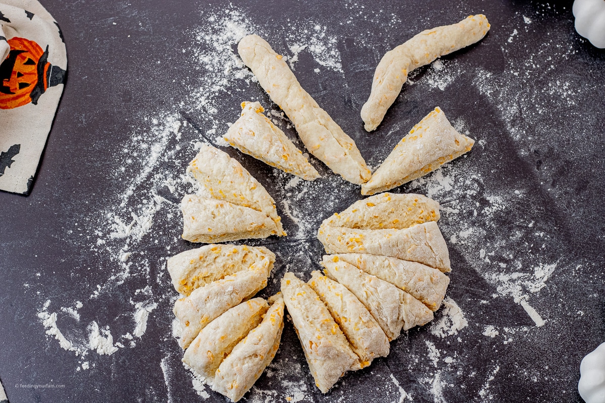 biscuit dough sliced into 16 different pieces