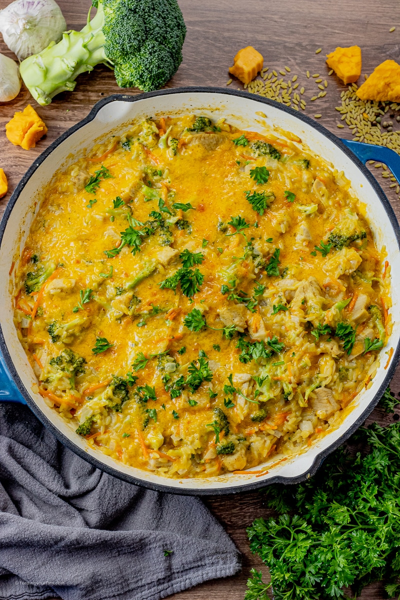 big pan of chicken orzo recipe topped with cheese