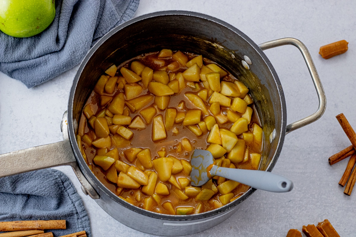 caramel and chopped apples in a large pot