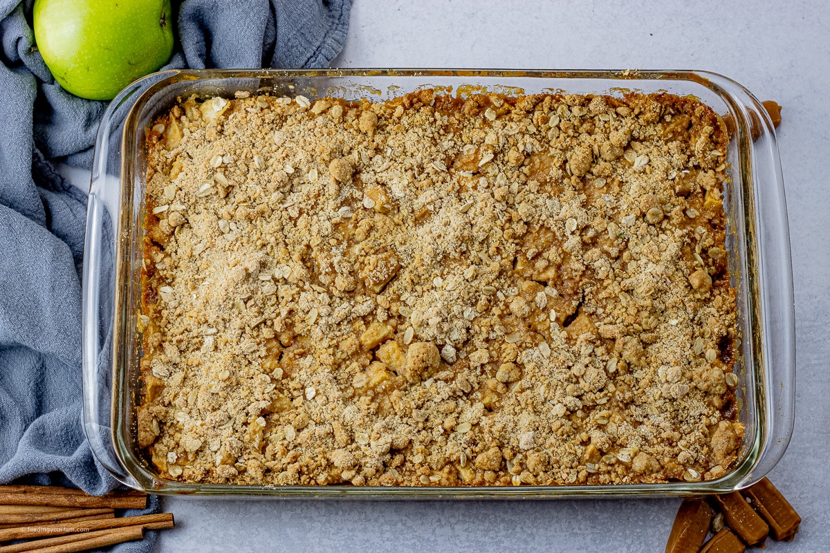 baked caramel apple bars in a glass baking dish