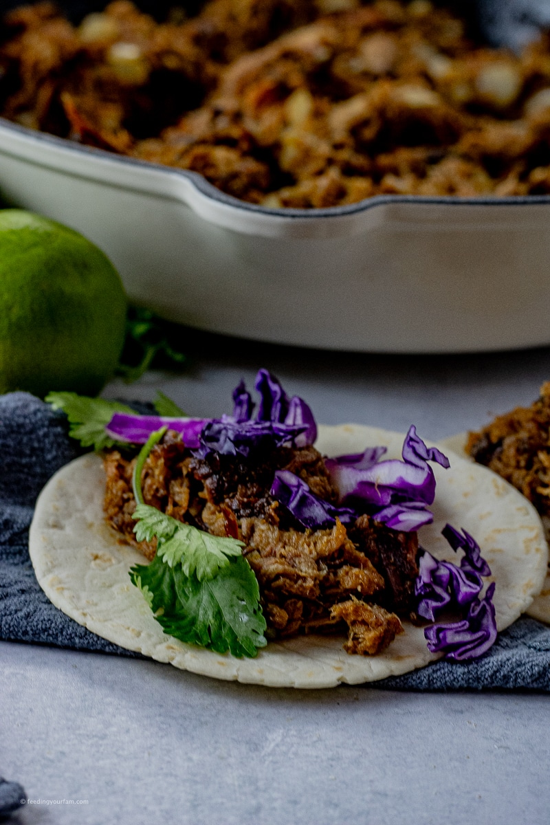 Pulled pork tacos are perfect for a quick and easy weeknight meal, or make up a batch to feed a crowd. This recipe for pork tacos is easily made with leftover shredded pulled pork to make this a meal ready in under 20 minutes.