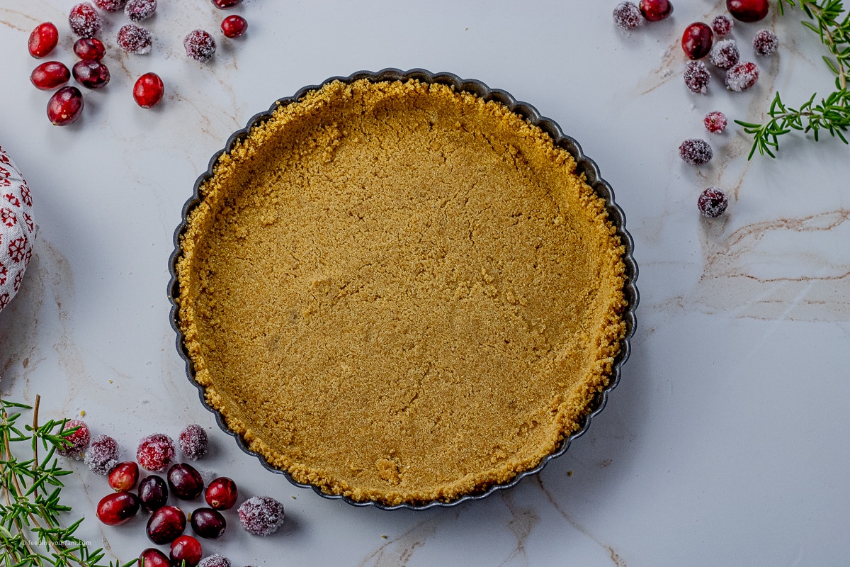 graham cracker crust in a tart pan