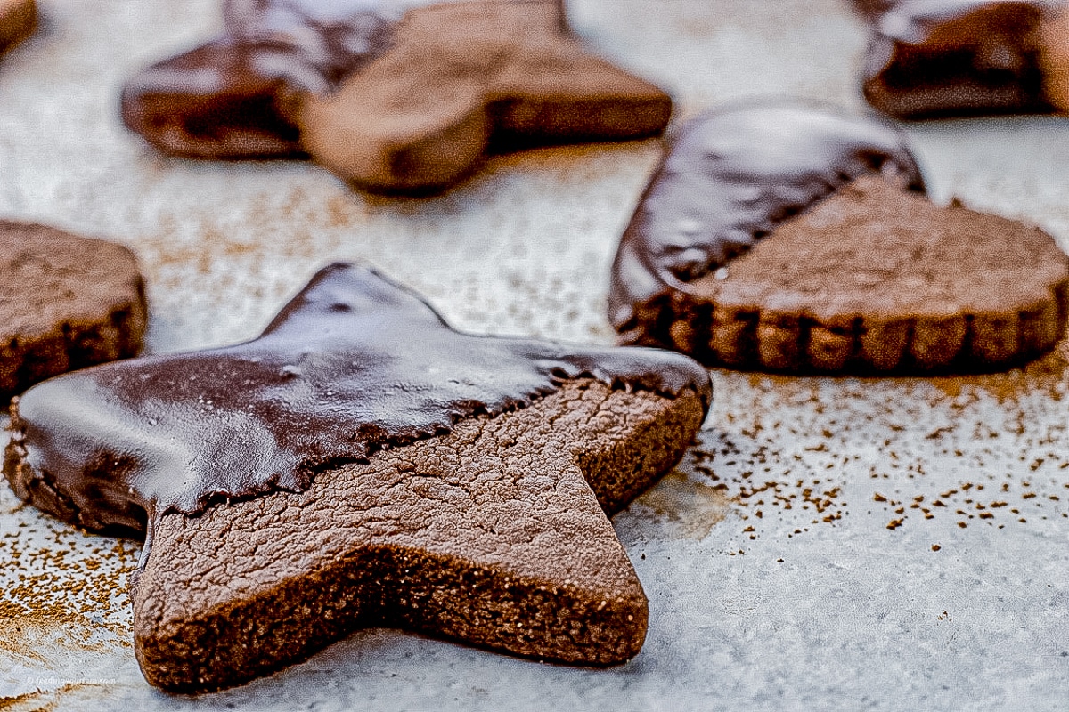 chocolate star and heart cookies, half dipped in chocolate