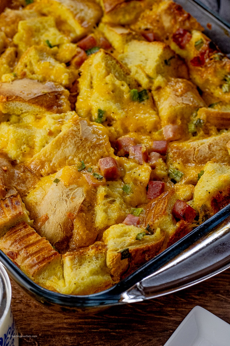 Overnight breakfast casserole with bread and eggs. Easy breakfast casserole made with bread, ham and eggs for a simple, filling breakfast.