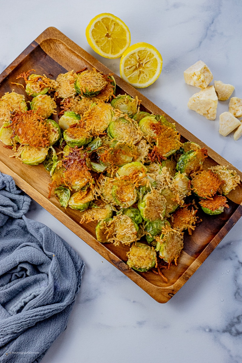 brussel sprouts cut in half and cooked in parmesan cheese