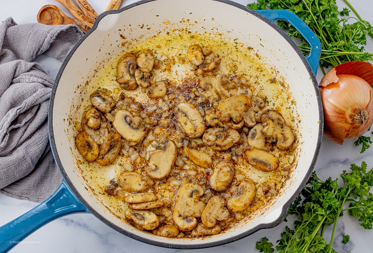 caramelized onions and mushrooms in a large enameled cast iron pan
