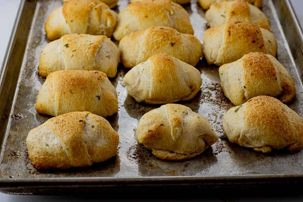 baked stuffed crescent rolls that have been stuffed with chicken