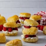 cream puff filled with cream and raspberries
