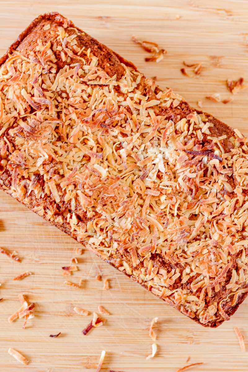 pumpkin bread topped with toasted coconut flakes
