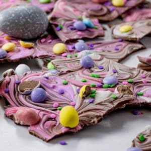 chocolate bark with swirls of pastel colors and easter candies on top