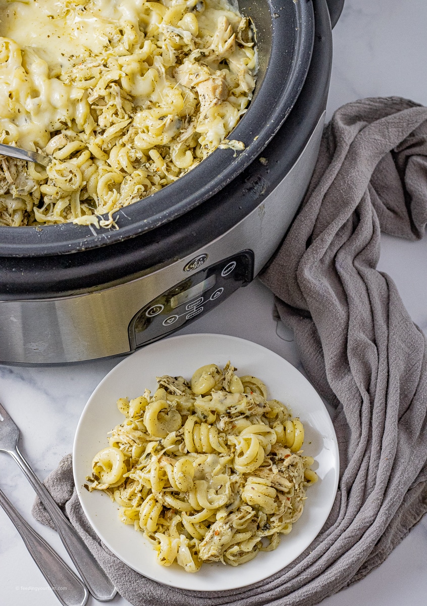 Homemade, flavorful, simple, and delicious, slow cooker pesto chicken is pure comfort food. Slow cooker chicken breast recipe.
