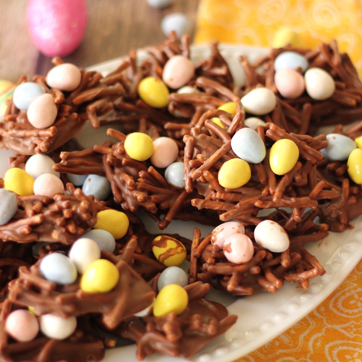 cookies that look like bird's nests topped with chocolate egg shaped candies