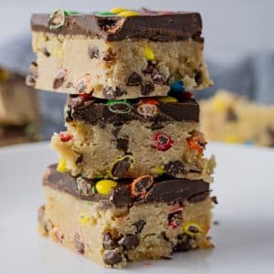 stack of no bake chocolate chip cookie dough bars