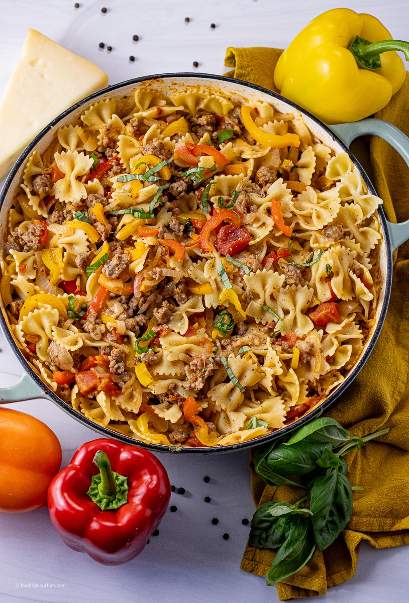 Italian Sausage and Pepper Pasta is an easy, savory 20 minute meal, perfect for a busy weeknight that the whole family will enjoy. Easy dinner idea. Family meals.