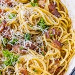 spaghetti noodles with bacon, parsley and parmesan cheese