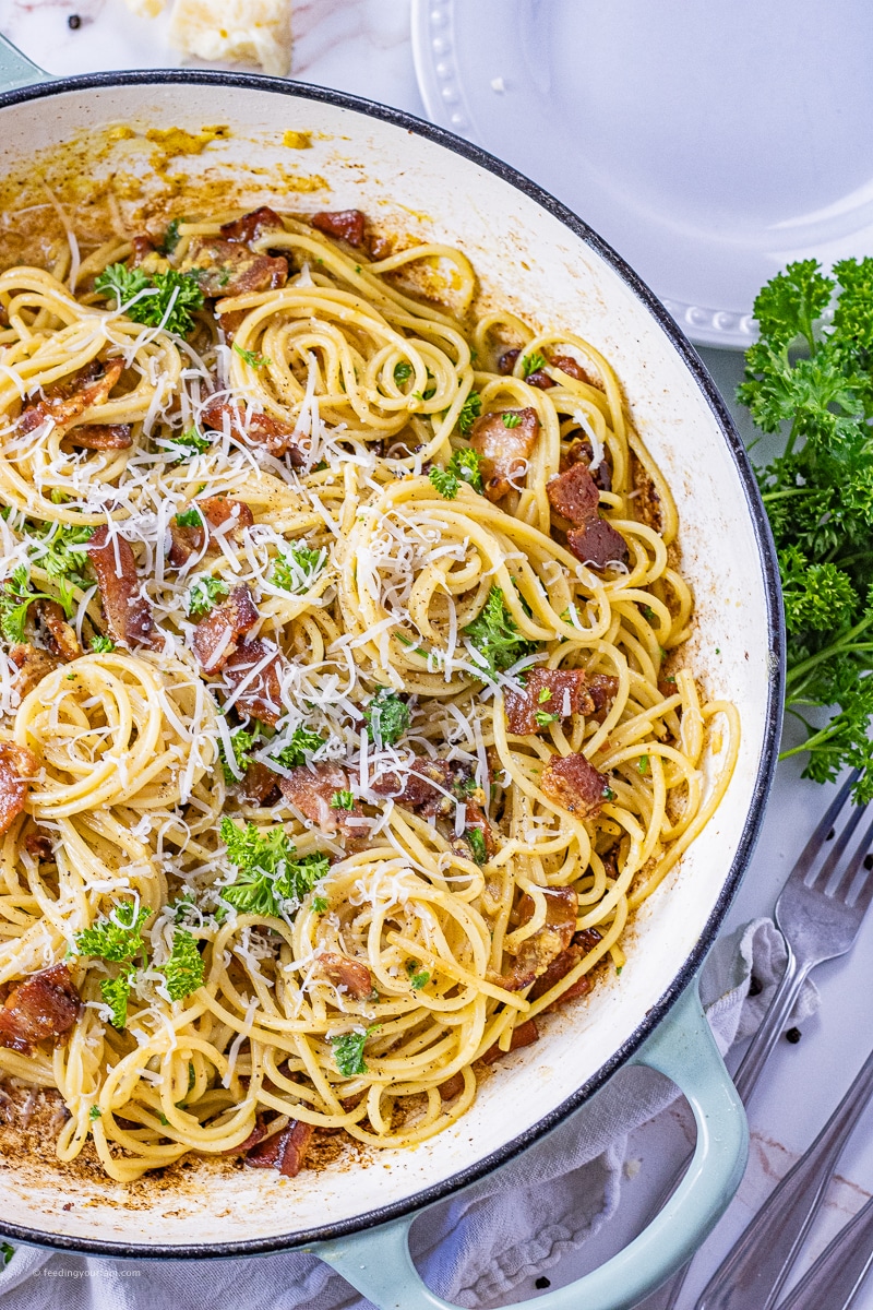 Pasta Carbonara is a creamy pasta dish that comes together quickly and has the amazing flavors of bacon and parmesan cheese. Easy enough to make on a busy weeknight for a simple dinner.