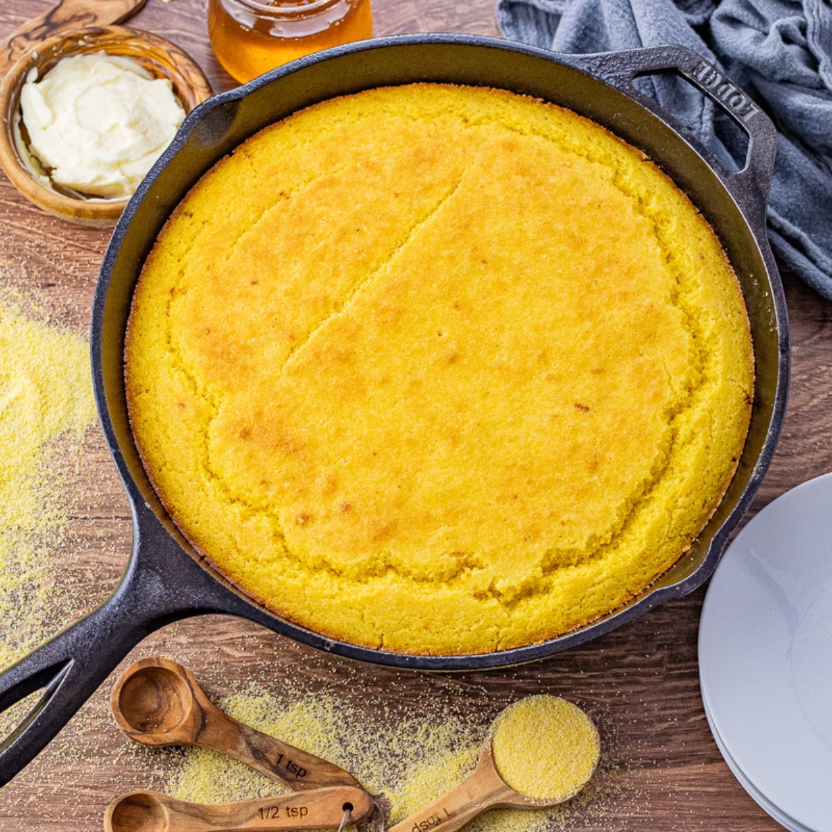 cast iron pan filled with cornbread