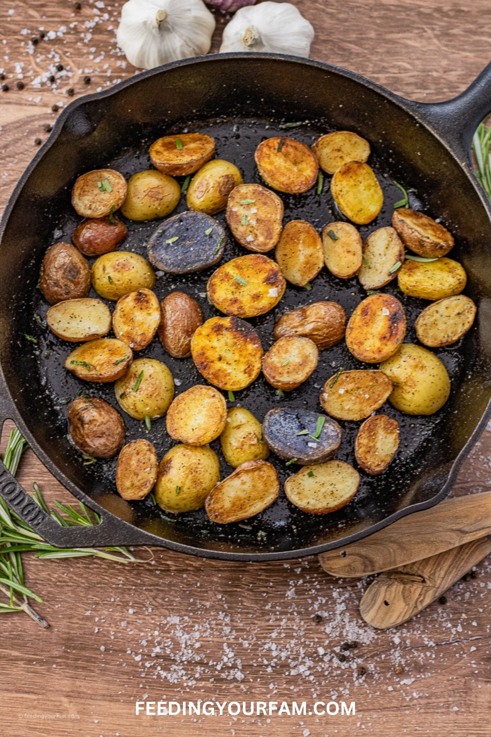 Learn how to make crisp and delicious Cast Iron Skillet Potatoes. Baby potatoes are cooked right on the stovetop in a cast iron skillet for perfectly crisp on the outside and fluffy inside potatoes.