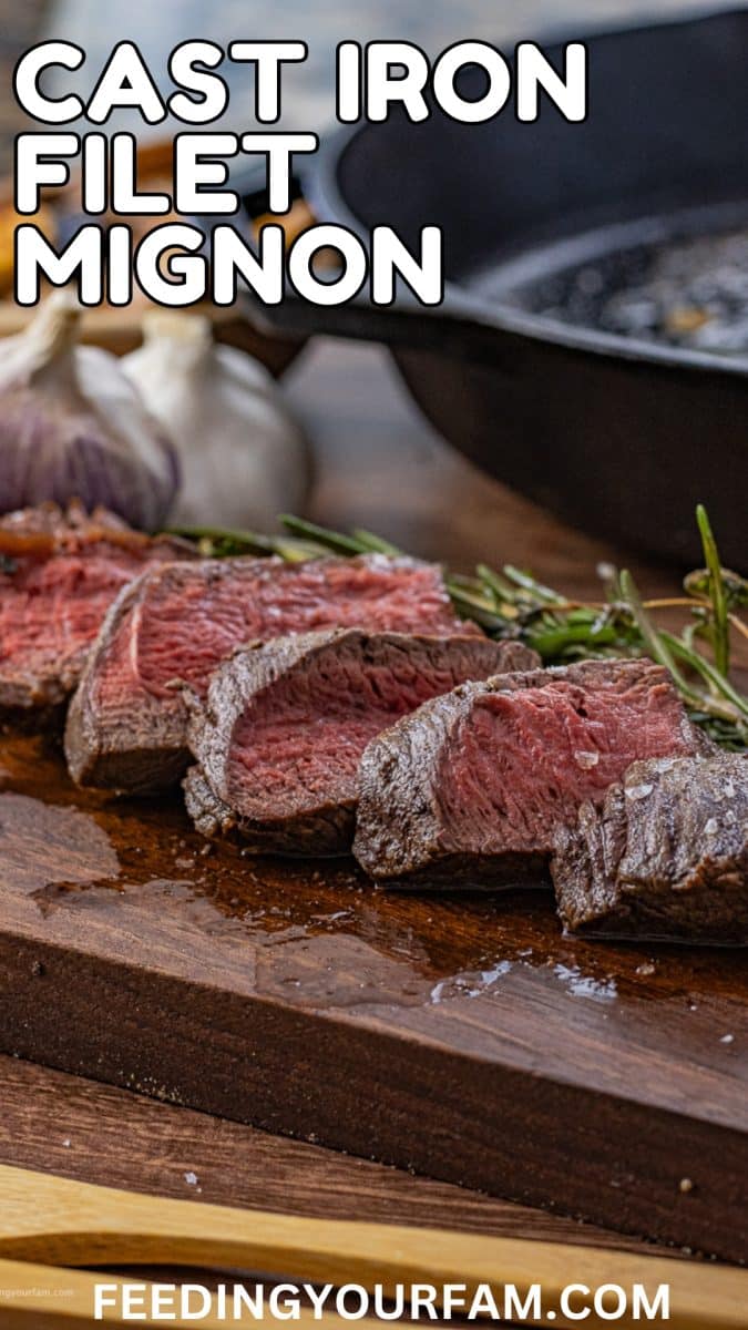 sliced filet mignon on a wooden cutting board with the words cast iron filet mignon written on the image