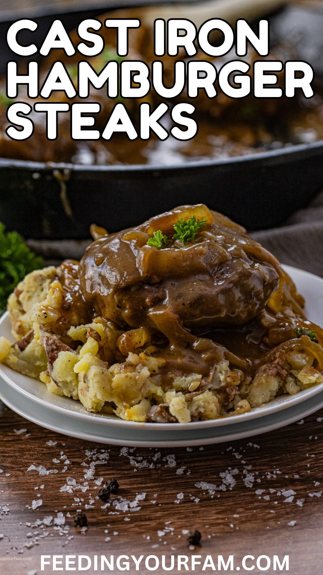Hamburger Steak with Onion Gravy is a perfect, cast iron one pan, weeknight meal. Seasoned ground beef is, formed into patties, and cooked in a delicious onion gravy.