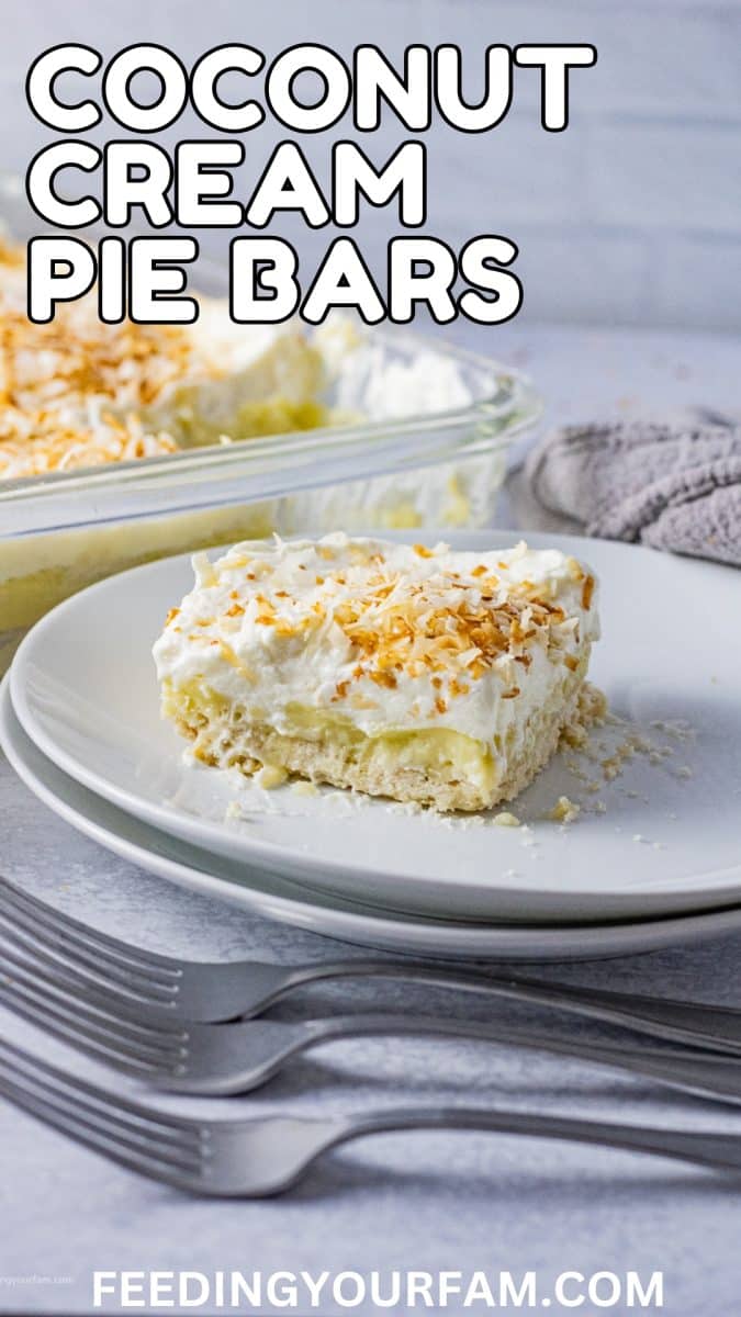 square of coconut pie bar on a white plate.