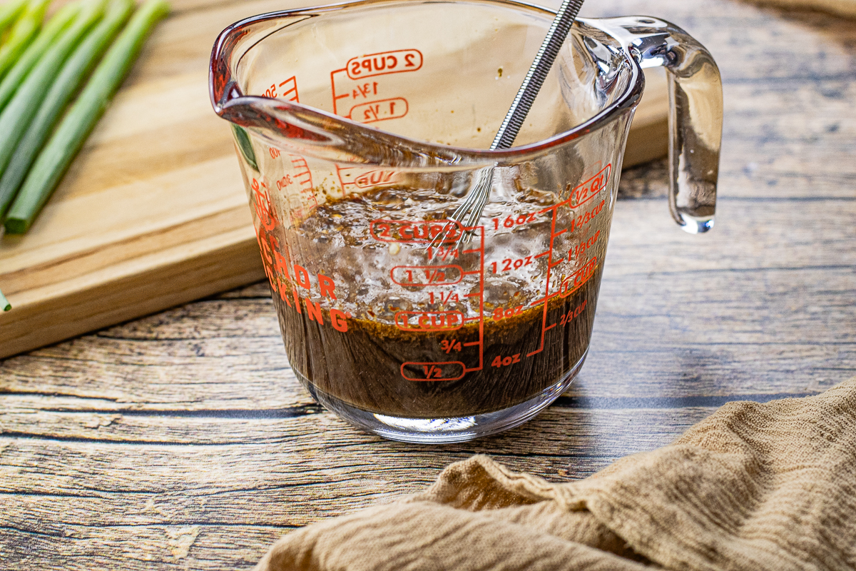 soy sauce sauce in a glass measuring cup