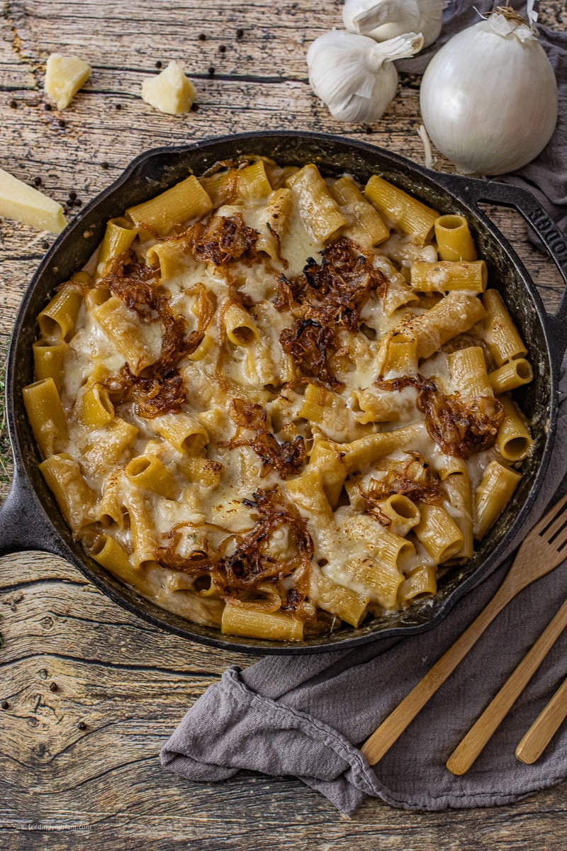 French onion mac and cheese is similar to French onion soup, with similar flavors, a Swiss cheese sauce, and soft, tender pasta to make it a complete meal.