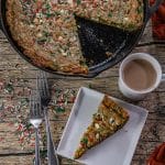 giant sugar cookie with Christmas sprinkles baked in a cast iron skillet