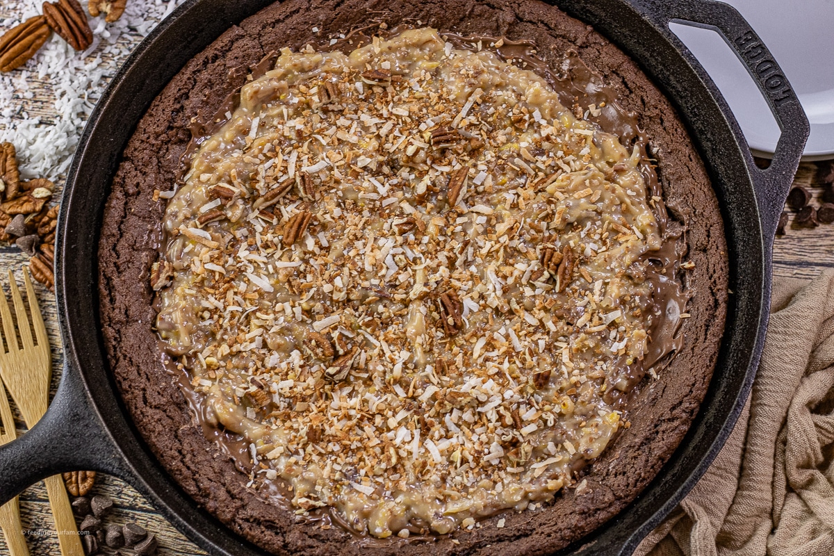 german chocolate cookie in a cast iron skillet