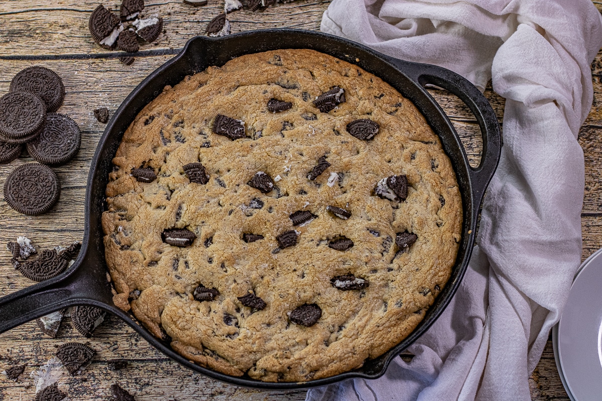 cookies and cream cookie baked in a cast iron skillet 