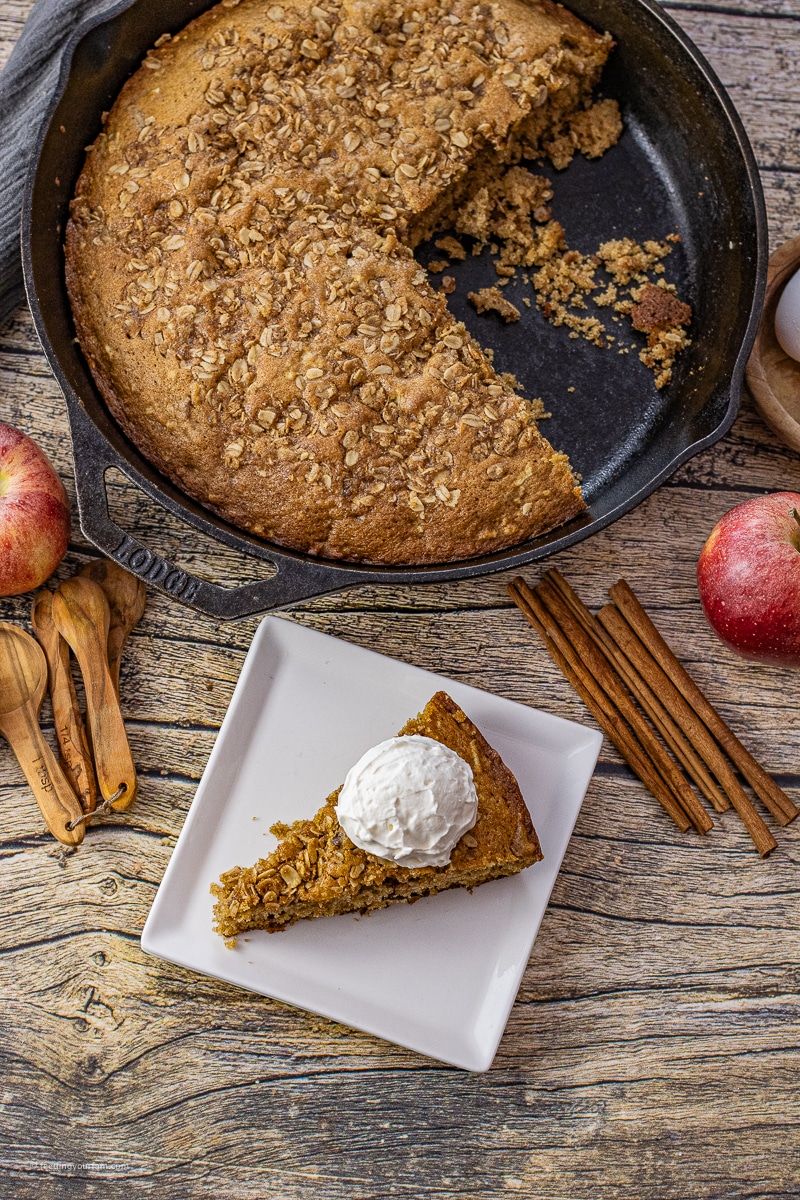 This Apple Cinnamon Cake baked in a cast iron skillet is soft in the center with a beautifully crisp outer crust. With the comforting flavors of apples and cinnamon, this cake is always a favorite treat.