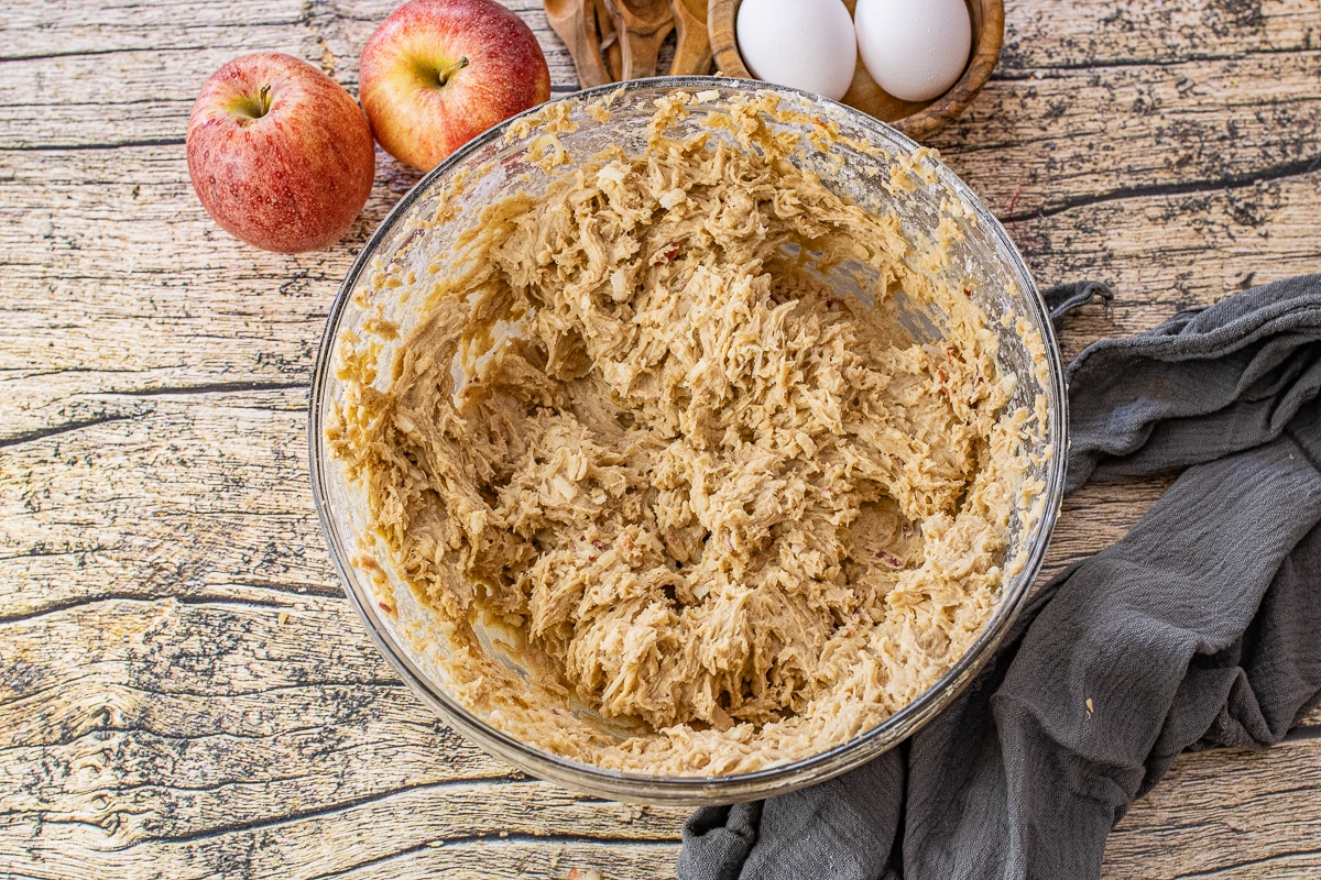 cinnamon apple cake batter in a mixing bowl