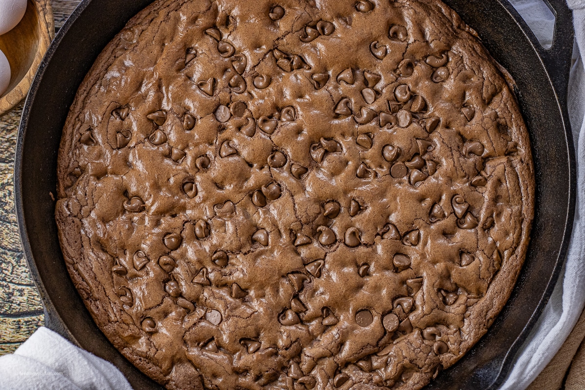 double chocolate chip skillet cookie in a cast iron pan