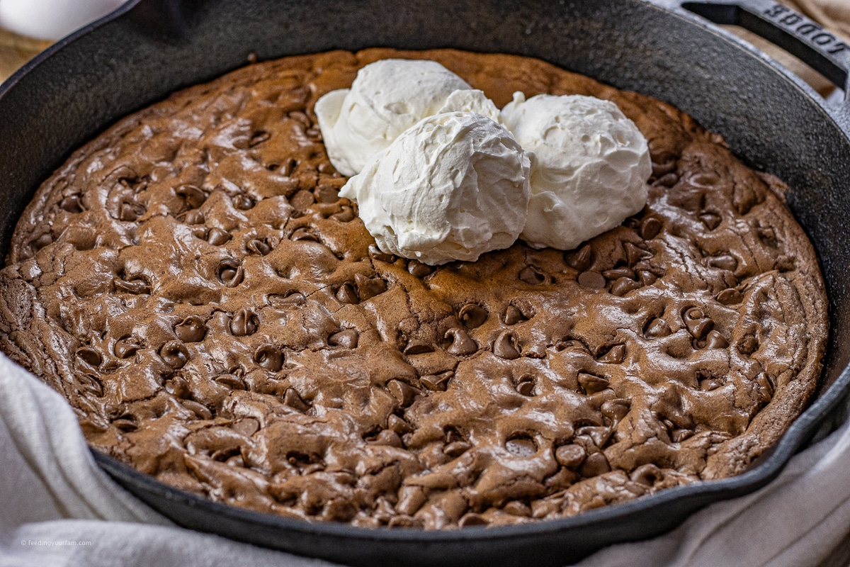 double chocolate chip cookie baked in a cast iron skillet