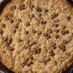 oatmeal chocolate chip cookie in a cast iron skillet