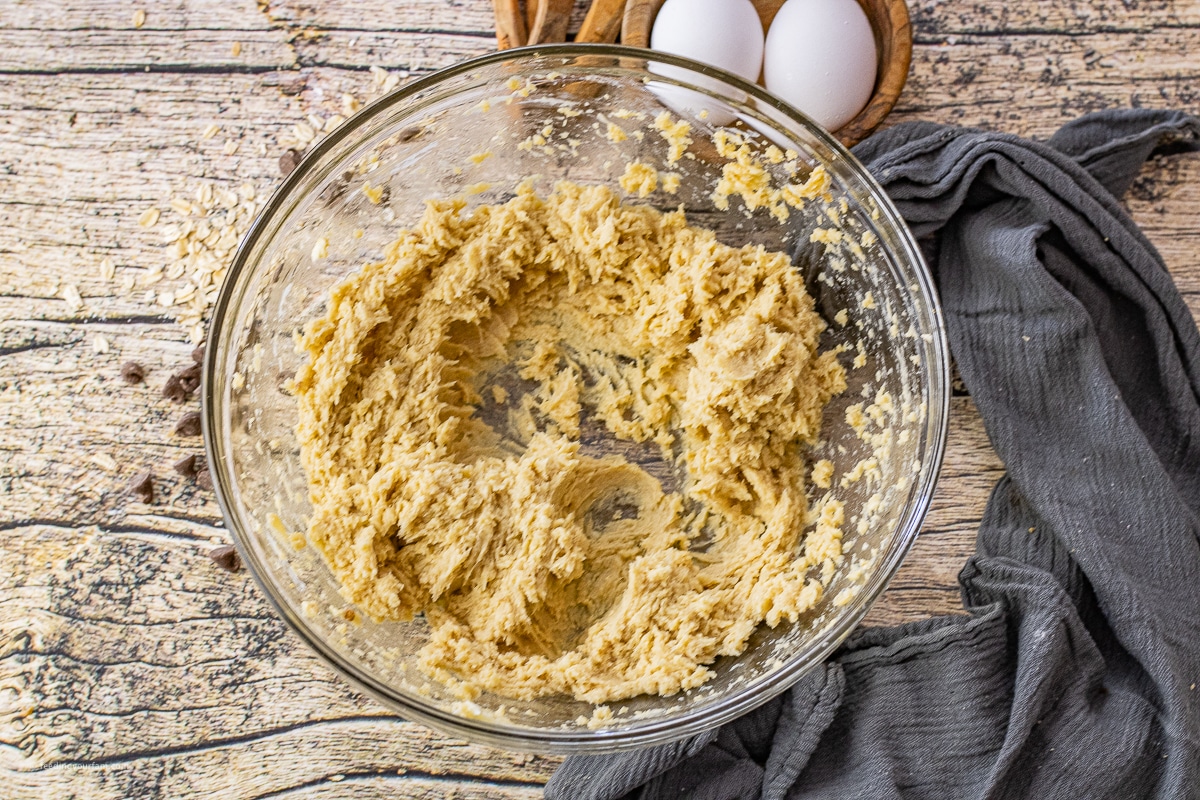 cookie dough in a class mixing bowl. 