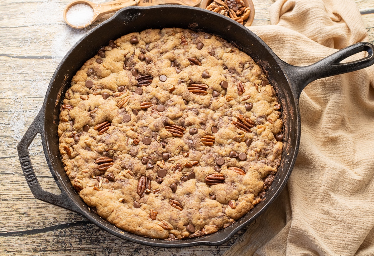 brown butter pecan cookie baked in a cast iron skillet to make a giant pizookie!