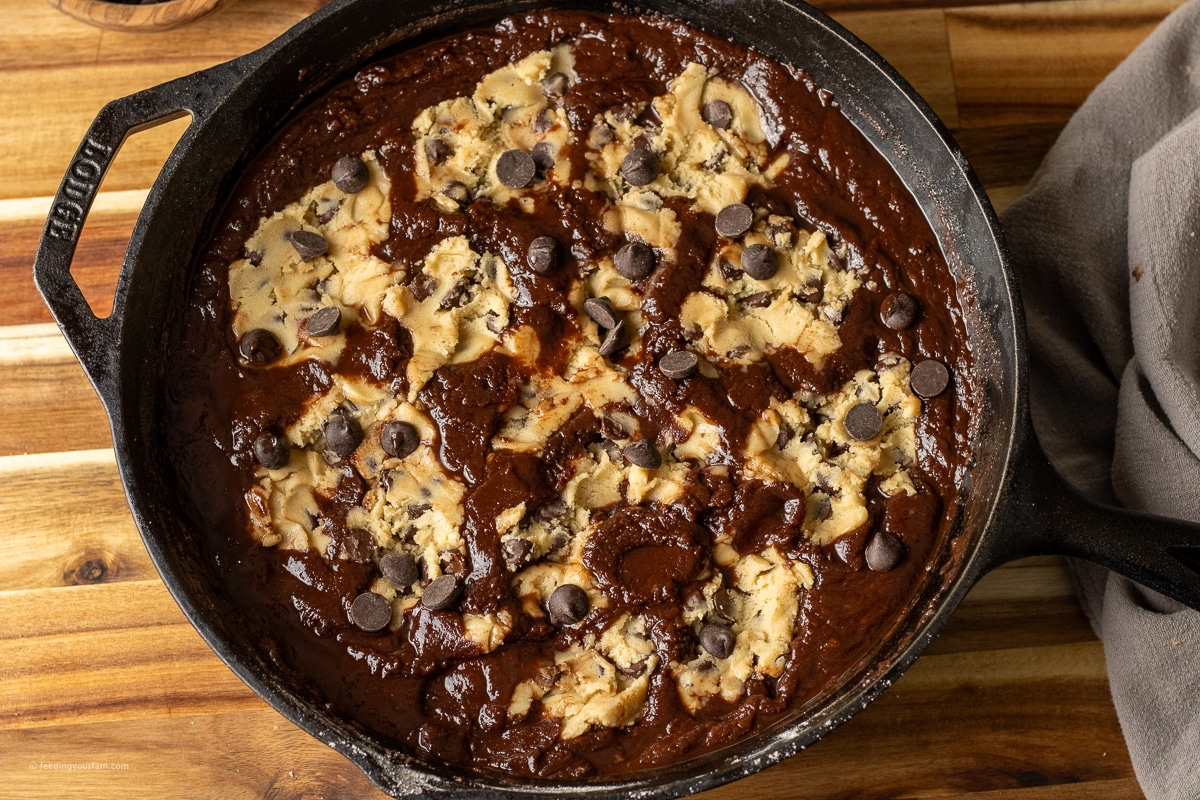 cookie brookie in a cast iron skillet, unbaked