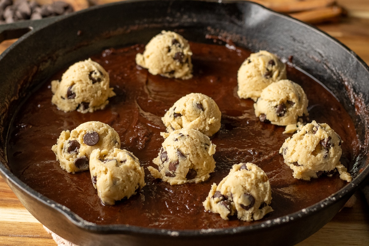unbaked brookie cookies recipe in a cast iron skillet 