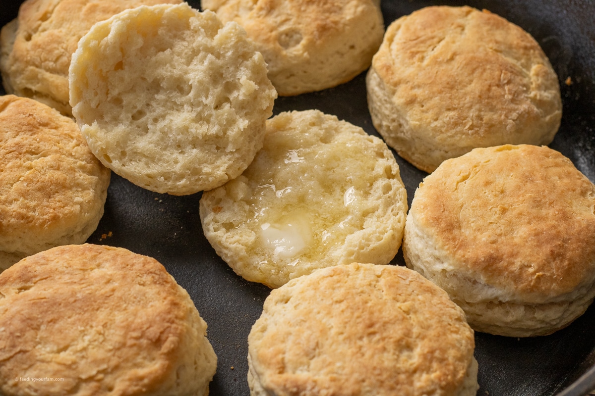 warm biscuits in a cast iron skillet with melted butter