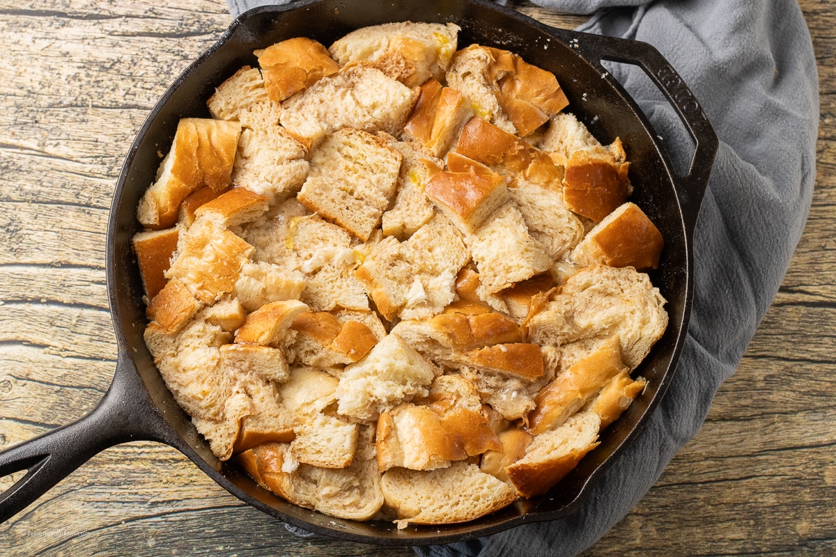 French toast casserole in a cast iron skillet unbaked